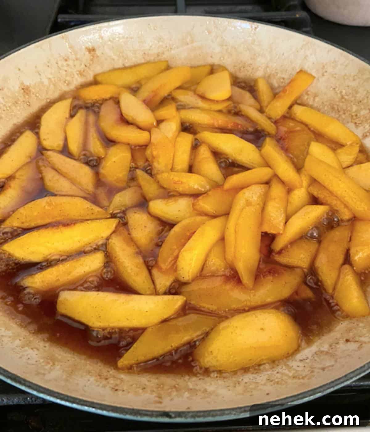 Skillet Caramelized Peaches with Brown Butter and Vanilla 7 Stewed peaches in skillet.