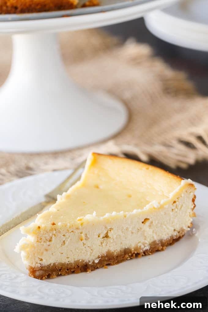 Decadent Maple Syrup Cheesecake Recipe with Brown-Butter Crust 4 Maple cheesecake whole on a plate.