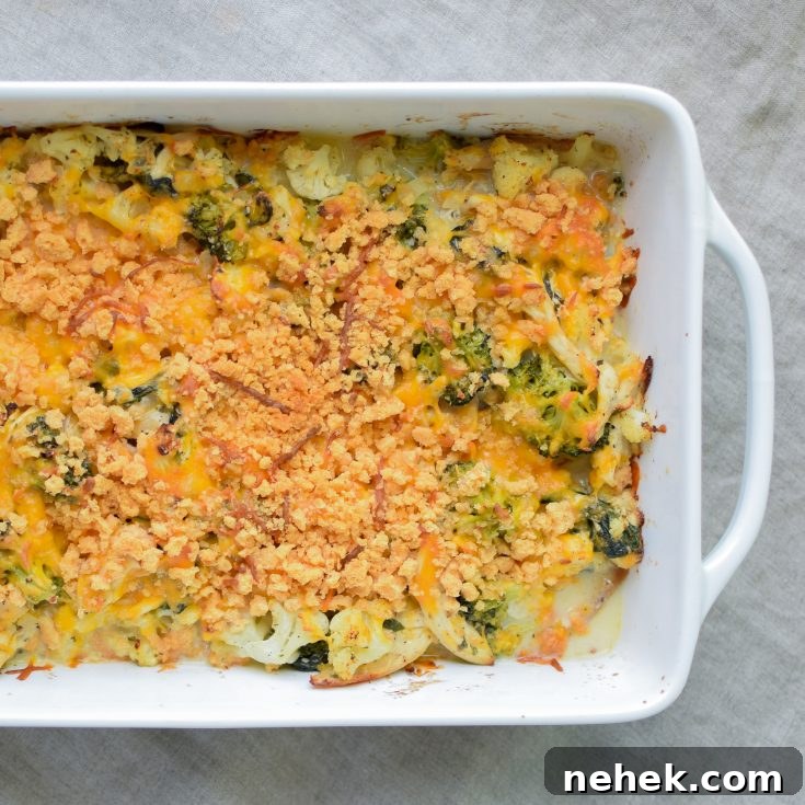 Veggie Loaded Rotisserie Chicken Casserole recipe - Delicious juicy chicken baked with broccoli, cauliflower, spinach, greek yogurt and more! Healthy and easy, from ProjectMealPlan.com
