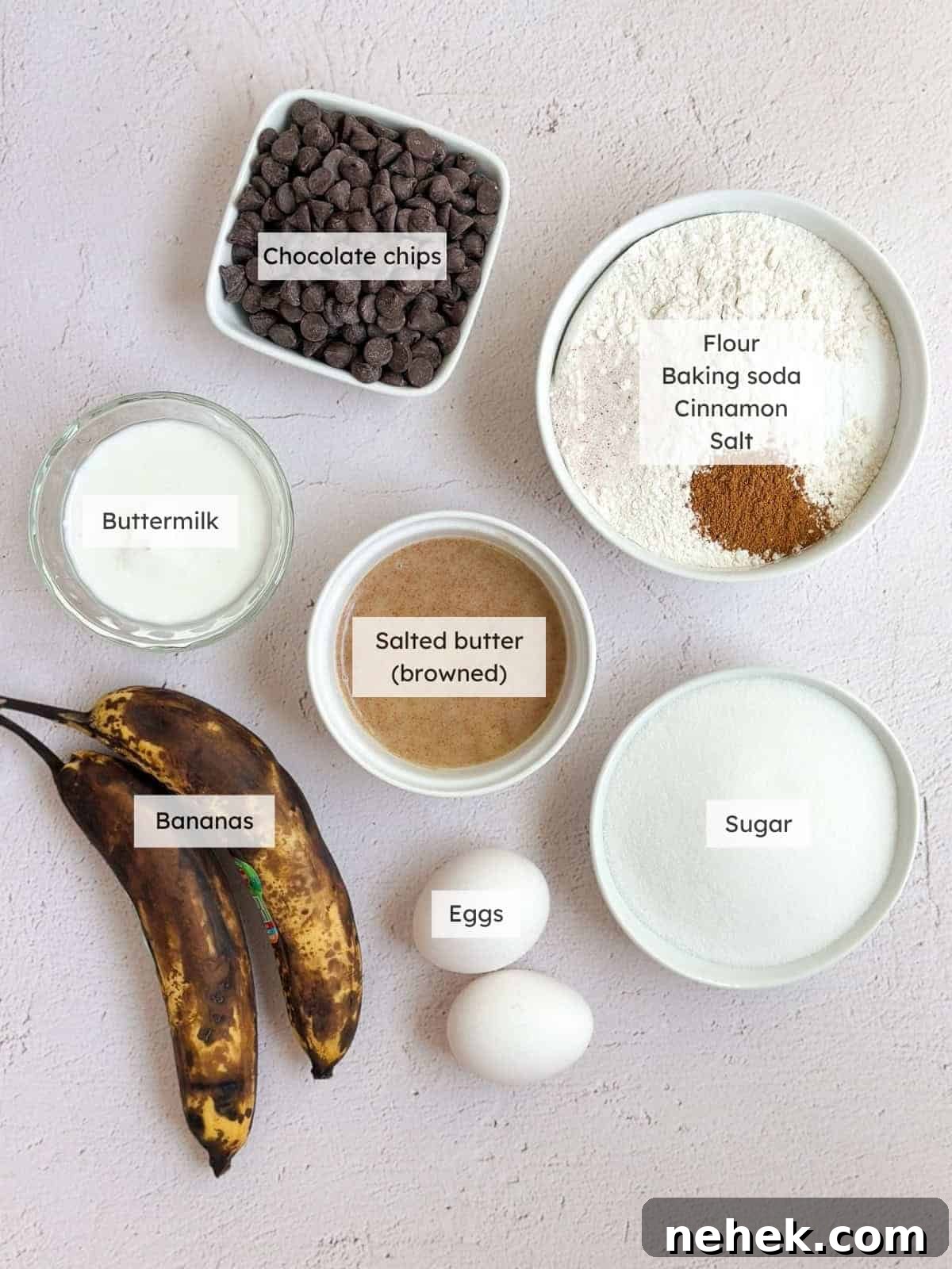 All of the ingredients needed for chocolate chip banana bread.