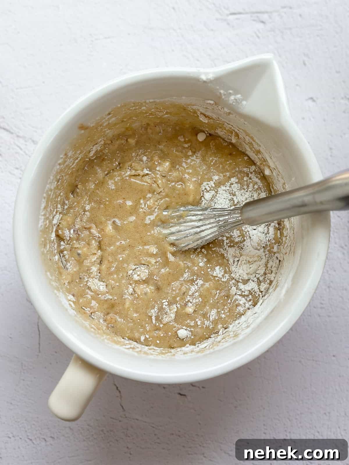 mixing in the dry ingredients.