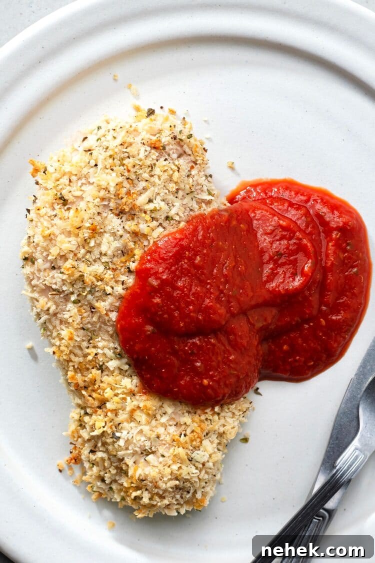 Lightened-Up Chicken Parmesan Recipe for Classic Flavor 2 Satisfy your comfort food cravings with this healthy recipe!