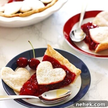 Classic Homemade Cherry Pie Recipe for Perfect Flaky Crust 9 Cherry Pie slices on red and blue rimmed plates with spoons. Pie in dish next to the plates.