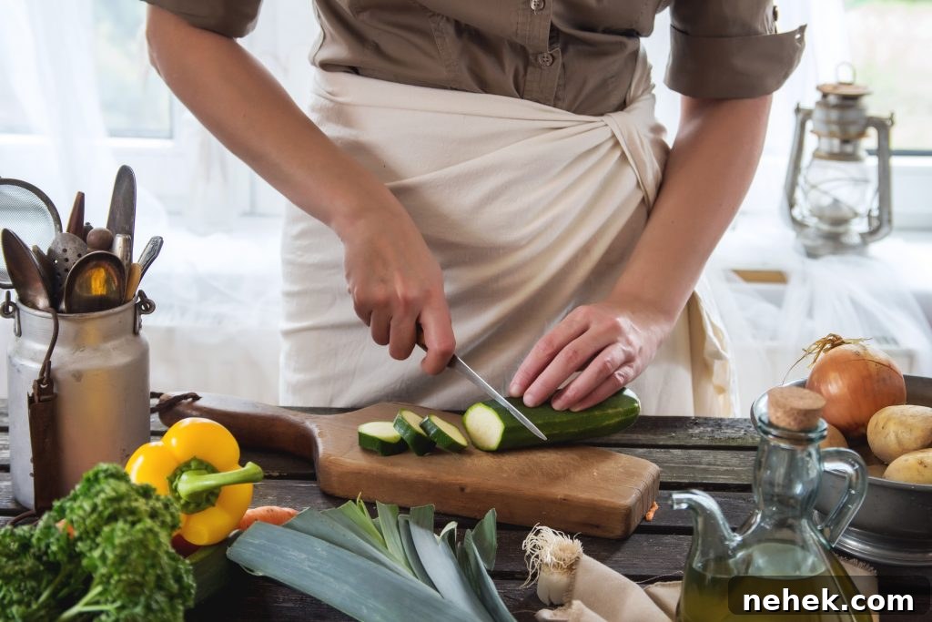 7 Simple Upgrades to Turn Your Kitchen into a Healthy Haven 2 woman cutting zucchini in a kitchen