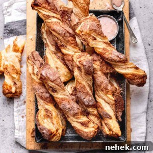 Flaky puff pastry twists with cinnamon.