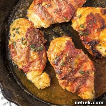 Chicken saltimbocca in skillet with wine butter sauce.