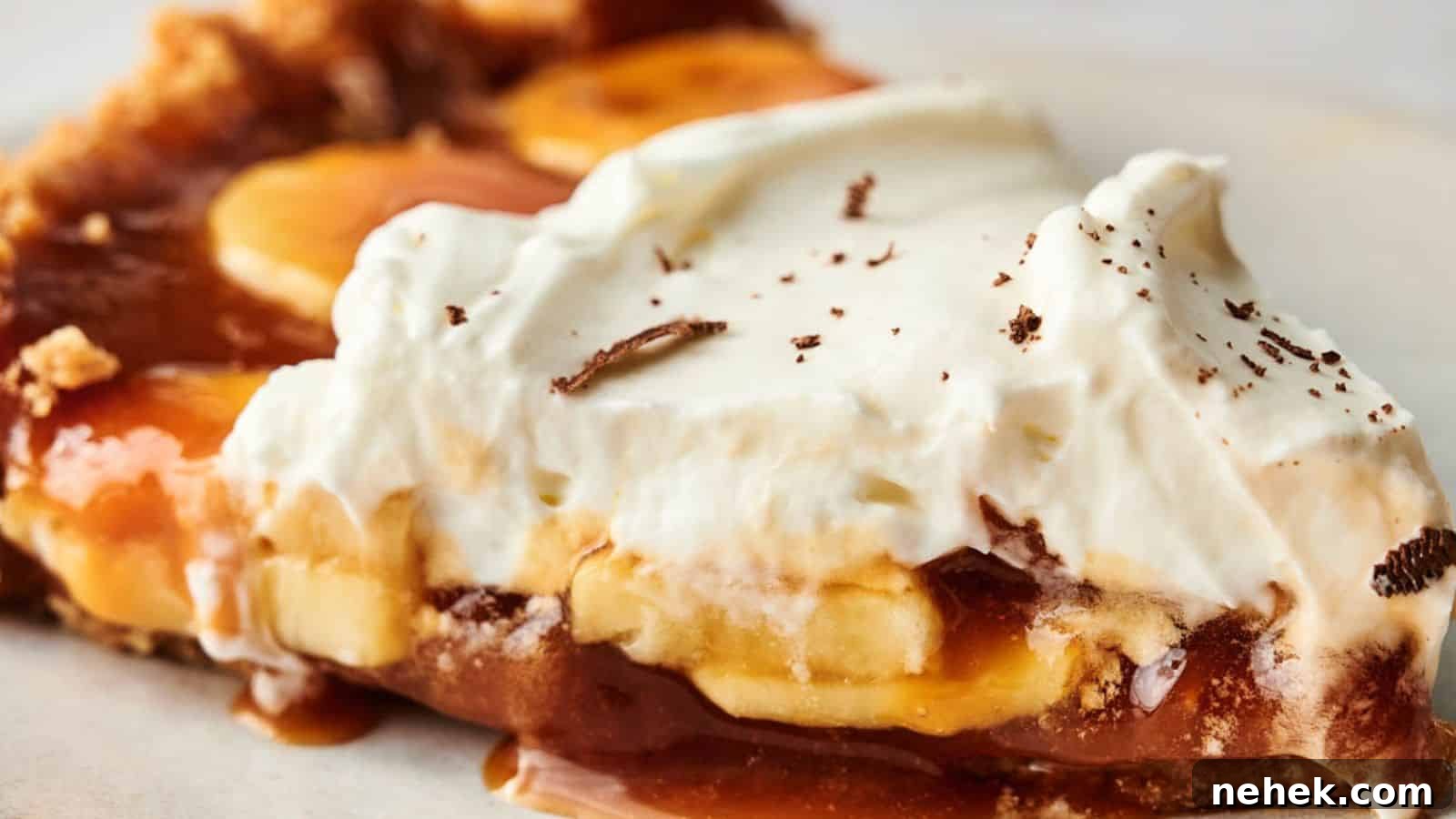15 Delicious Easter Recipes to Make Your Celebration Shine 14 A slice of Banoffee pie with whipped cream and caramel.