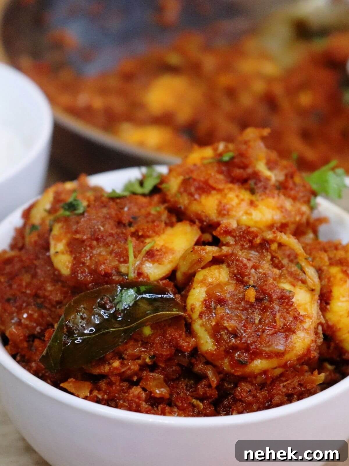 Mangalorean Prawn Sukka (Yetti Sukka) — Spicy Coastal Prawn Curry 2 close-up of prawn sukka served in a white bowl.