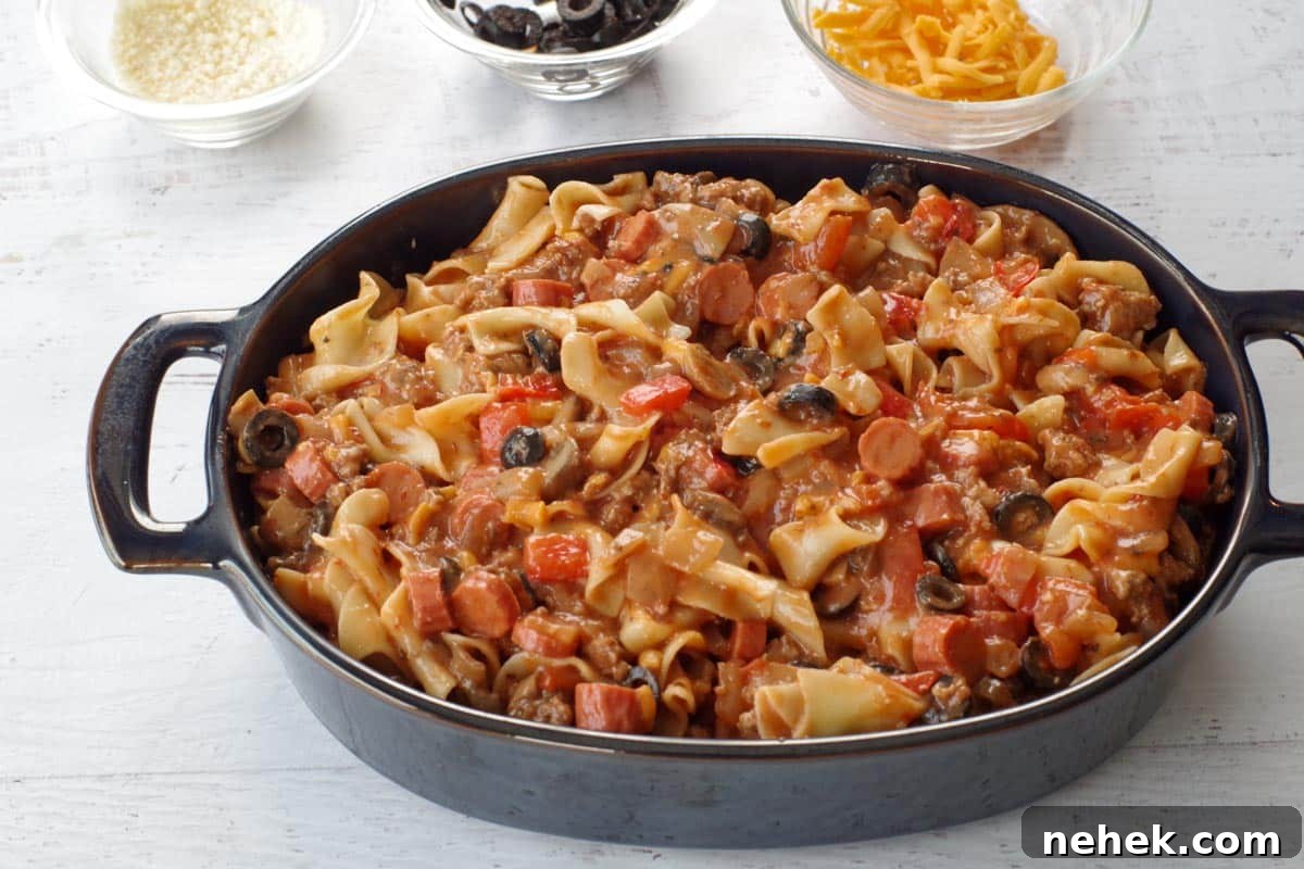 Low-Carb Pizza Casserole with Veggies and Mozzarella 8 Mixture placed in casserole dish