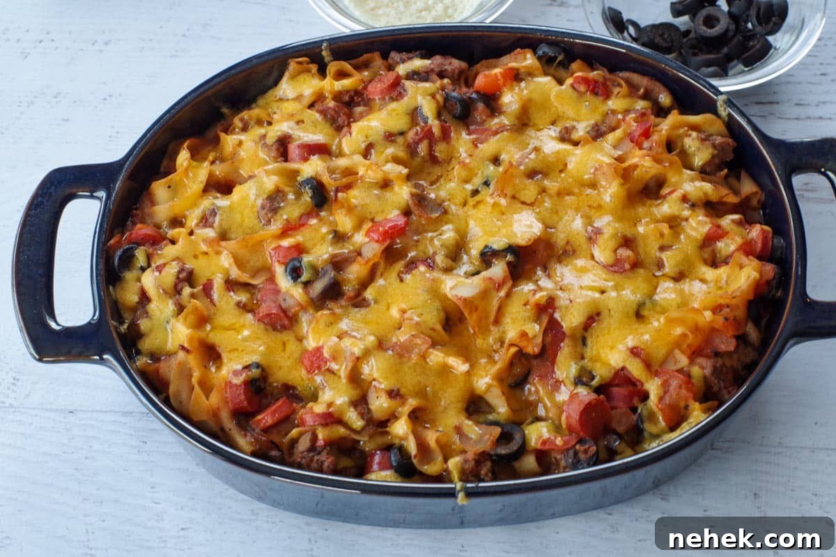 Low-Carb Pizza Casserole with Veggies and Mozzarella 9 Casserole with cheese melted on top