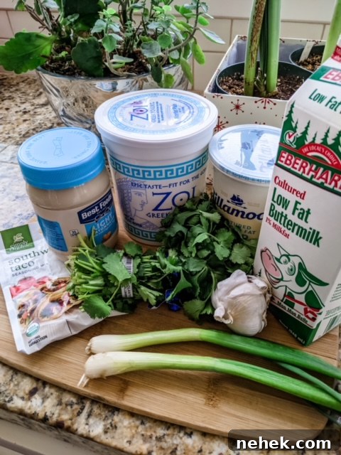 The ingredients for the Lighter Southwestern Buttermilk Ranch on a cutting board.