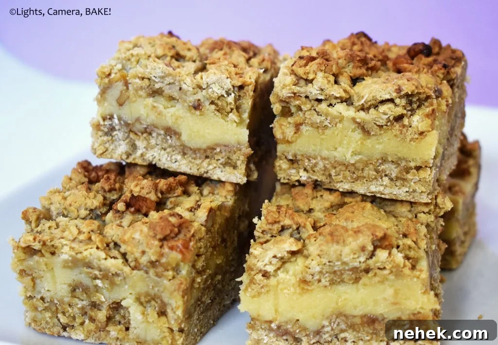 Candied walnut oat slice pieces on a plate.