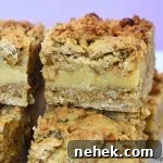 Candied walnut oat slice on a purple background.