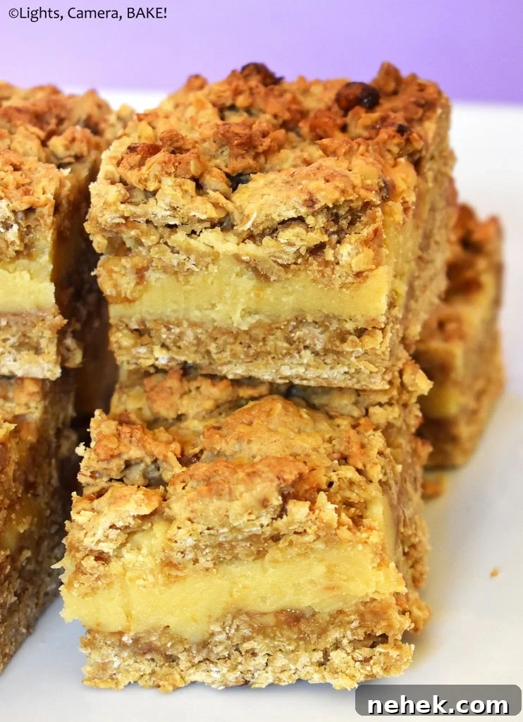 Slices of walnut caramel slice on a plate.