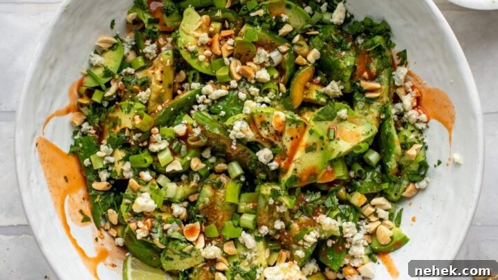 Smashed Buffalo Cucumber Salad with Avocado.