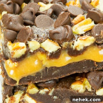 Chewy Caramel Swirl Brownies: Gooey Chocolate Dessert Recipe 2 slices of Caramel brownies with chocolate chips and pecans on top