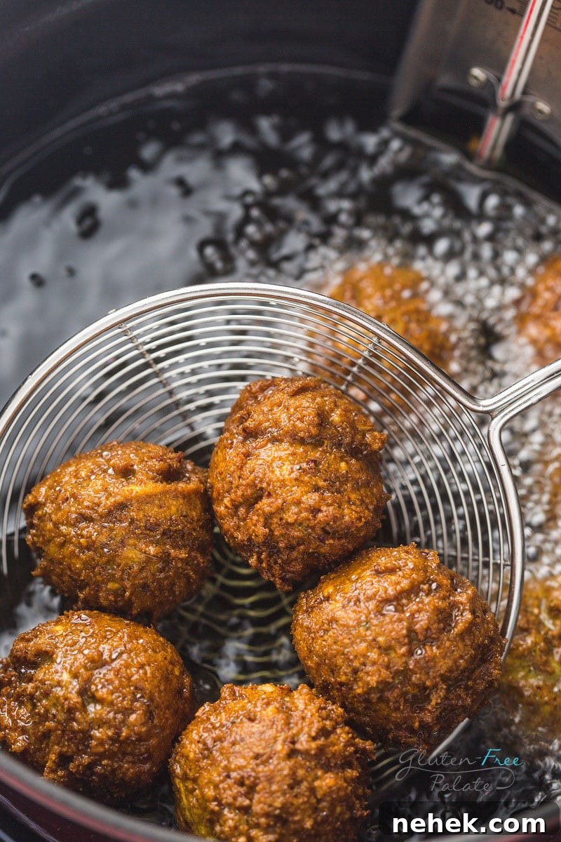 gluten-free falafels frying in oil