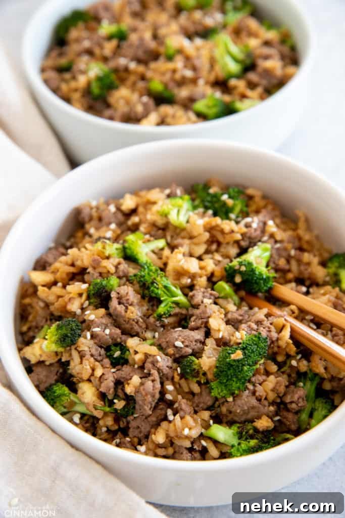 Ground Beef and Broccoli Fried Rice Recipe for Weeknight Dinner 3 side view of beef and broccoli fried rice with chopsticks on the side