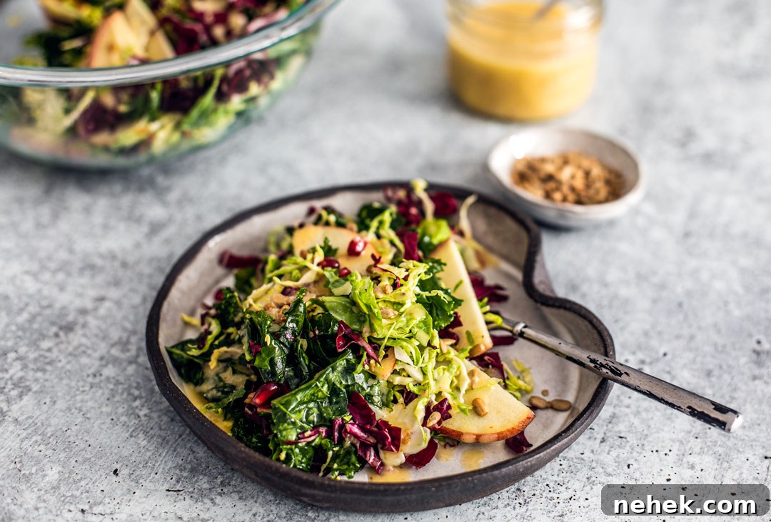 Plate full of winter crunch salad, side view.