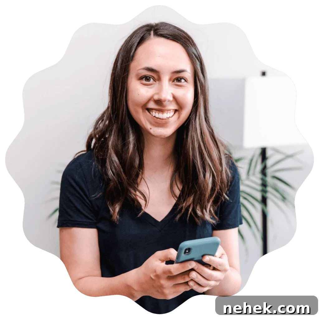 Fudgy Sourdough Discard Brownies You’ll Crave 15 Kayla Burton from Broken Oven Baking Company holding a phone.