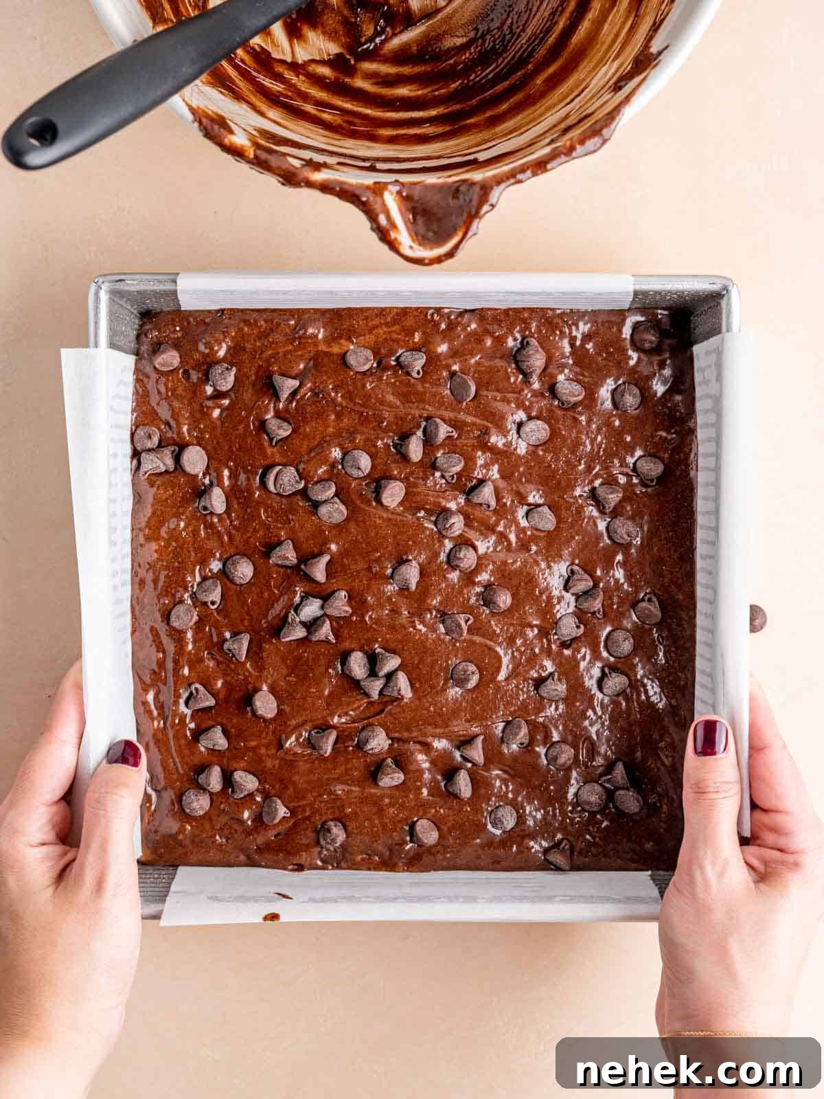 Fudgy Sourdough Discard Brownies You’ll Crave 9 Sourdough discard brownie batter in a square cake pan.