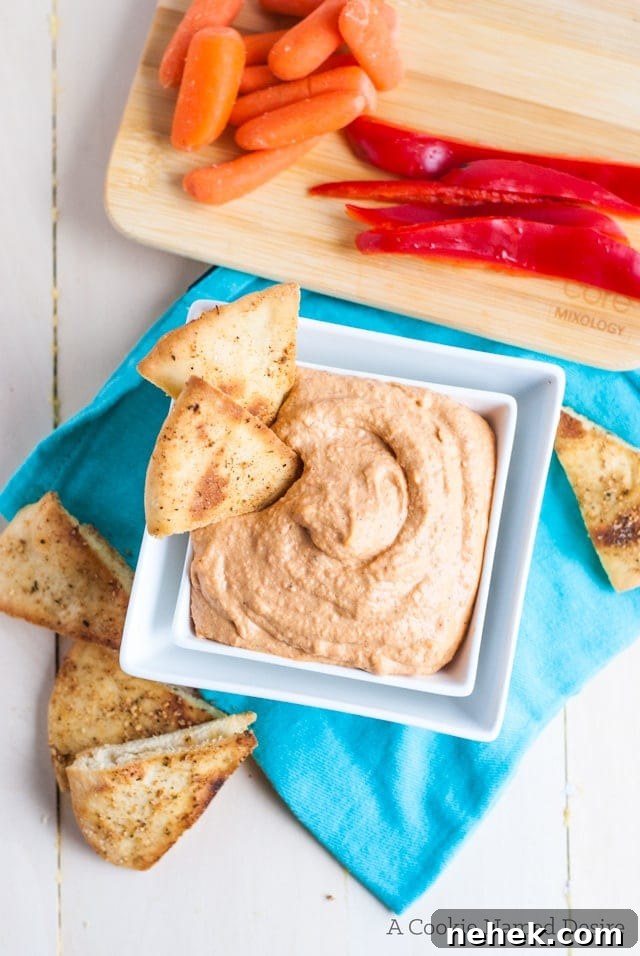 The creamiest roasted red pepper hummus with spiced pita chips