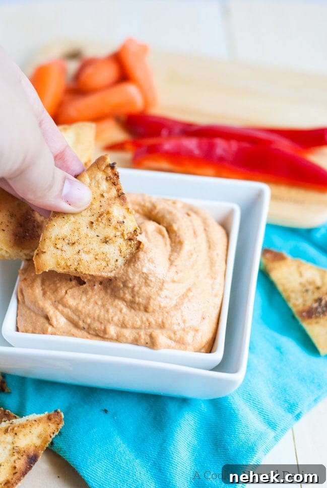 Creamy roasted red pepper hummus and pita chips