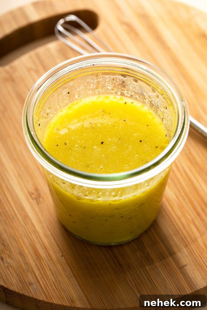 Fresh lemon vinaigrette in a small container