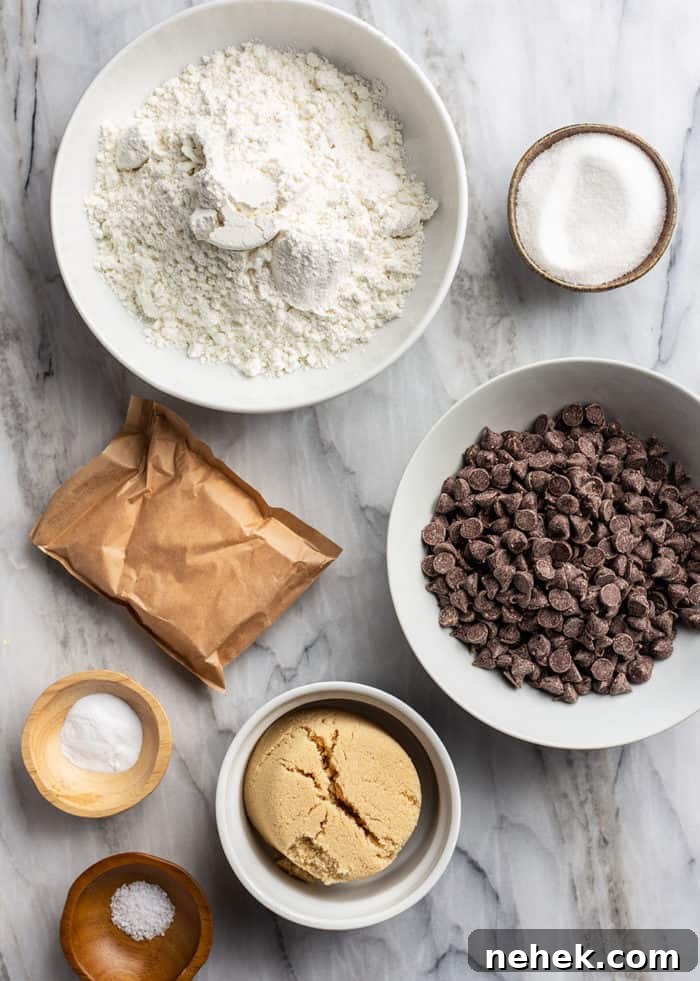Chocolate Chip Pudding Cookies Recipe — Soft, Chewy Treats 4 Ingredients for chocolate chip pudding cookies arranged on a marble countertop