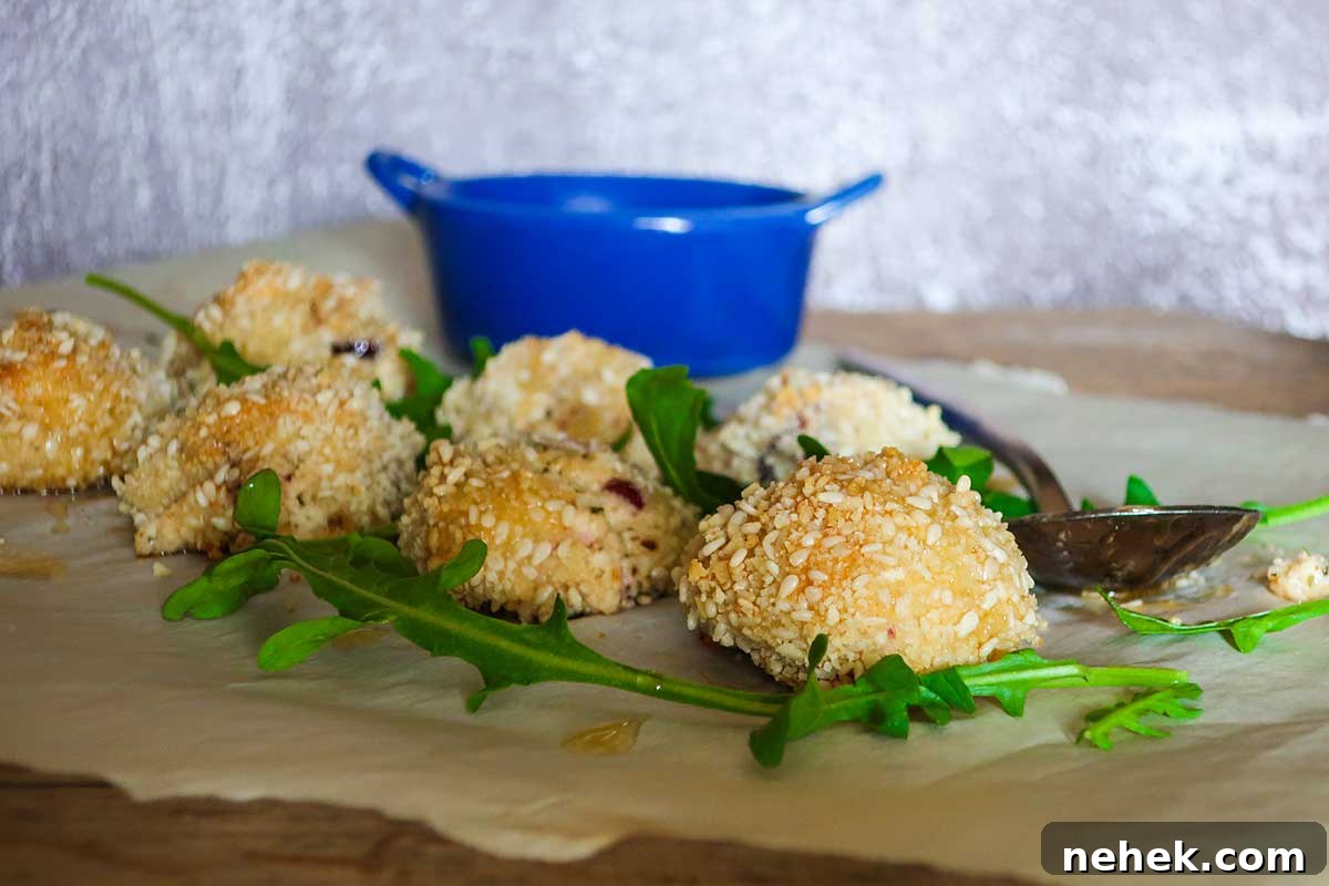 baked cheese balls drizzled with warm honey butter