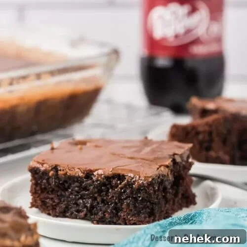 How Long Does Birthday Cake Stay Fresh? Shelf Life Guide 4 Dr. Pepper Cake cut and served on a plate.