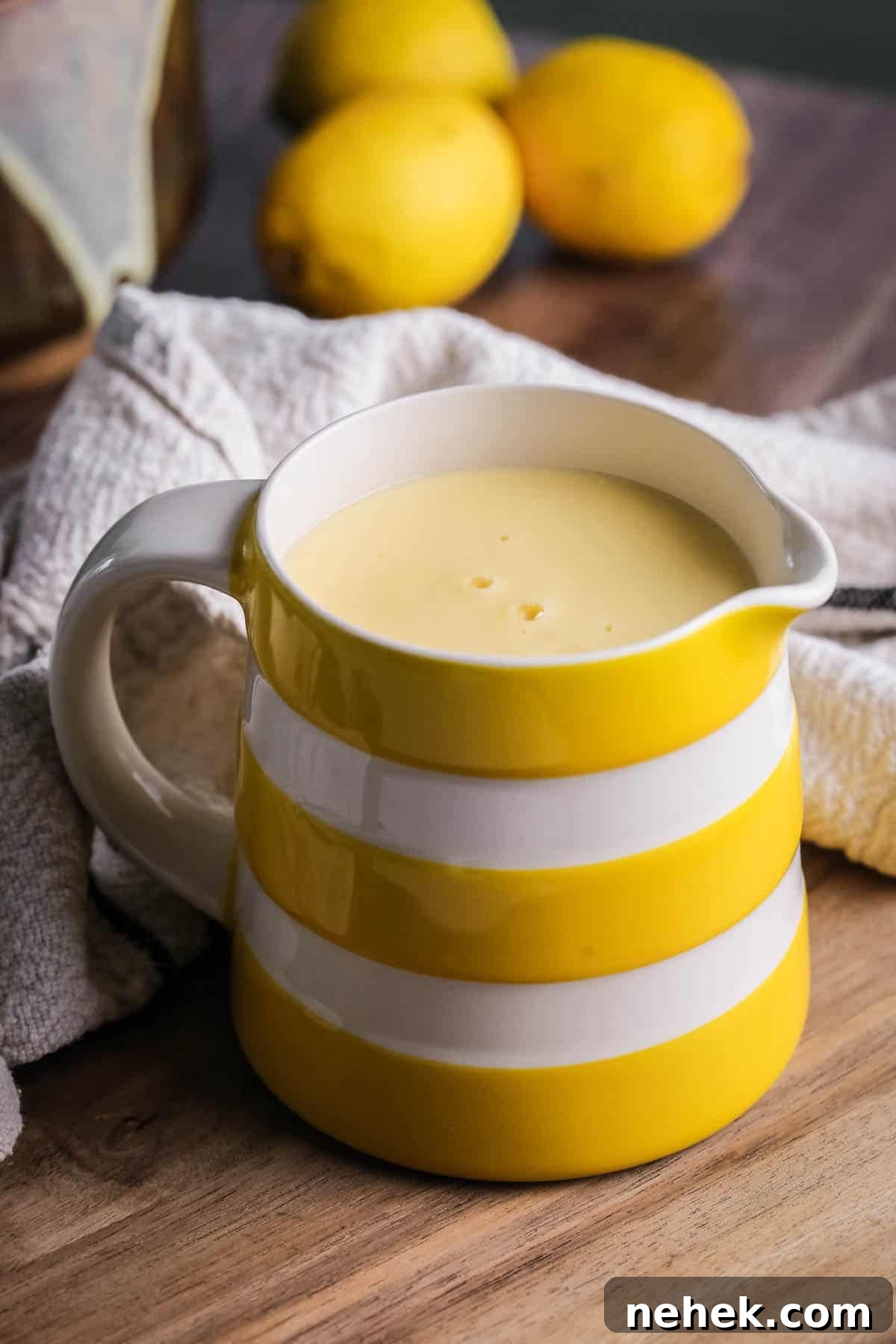 Lemon custard sauce in a jug.