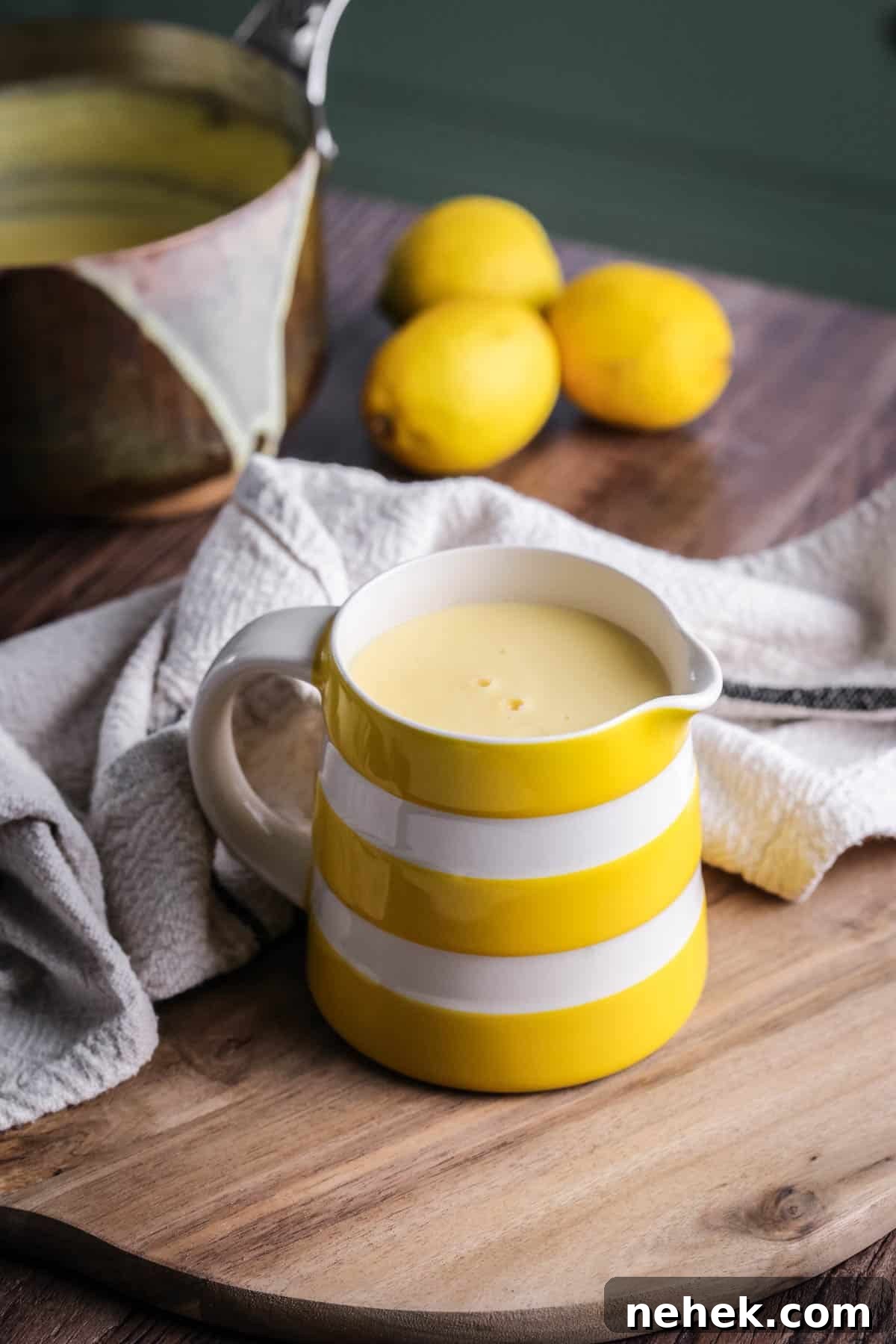 Lemon custard sauce in a jug.