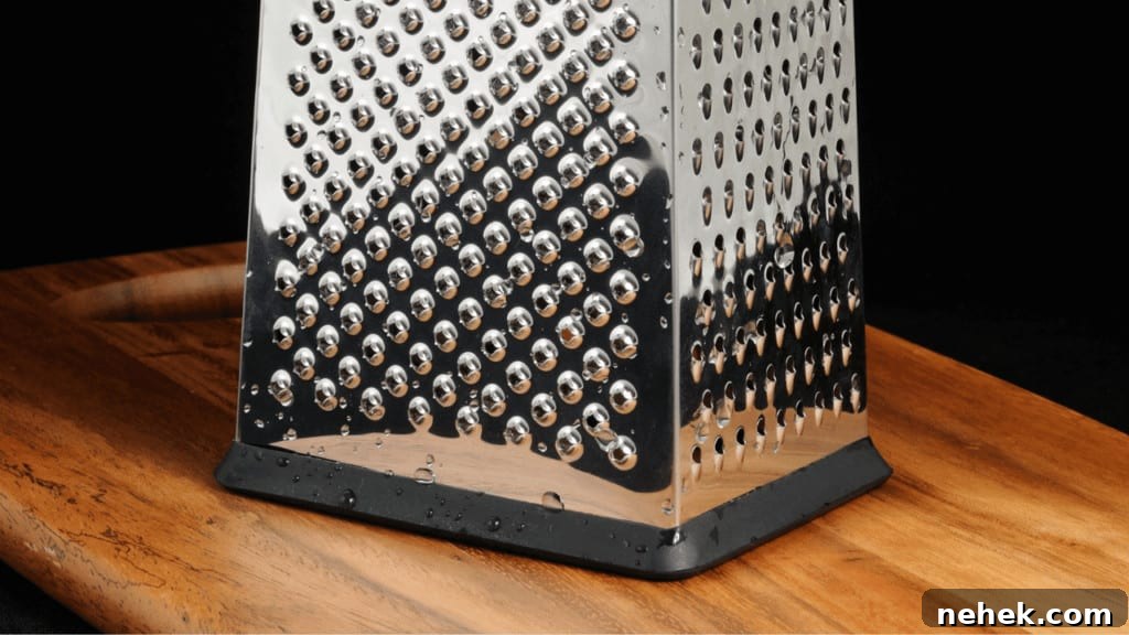 Place a box grater on a cutting board
