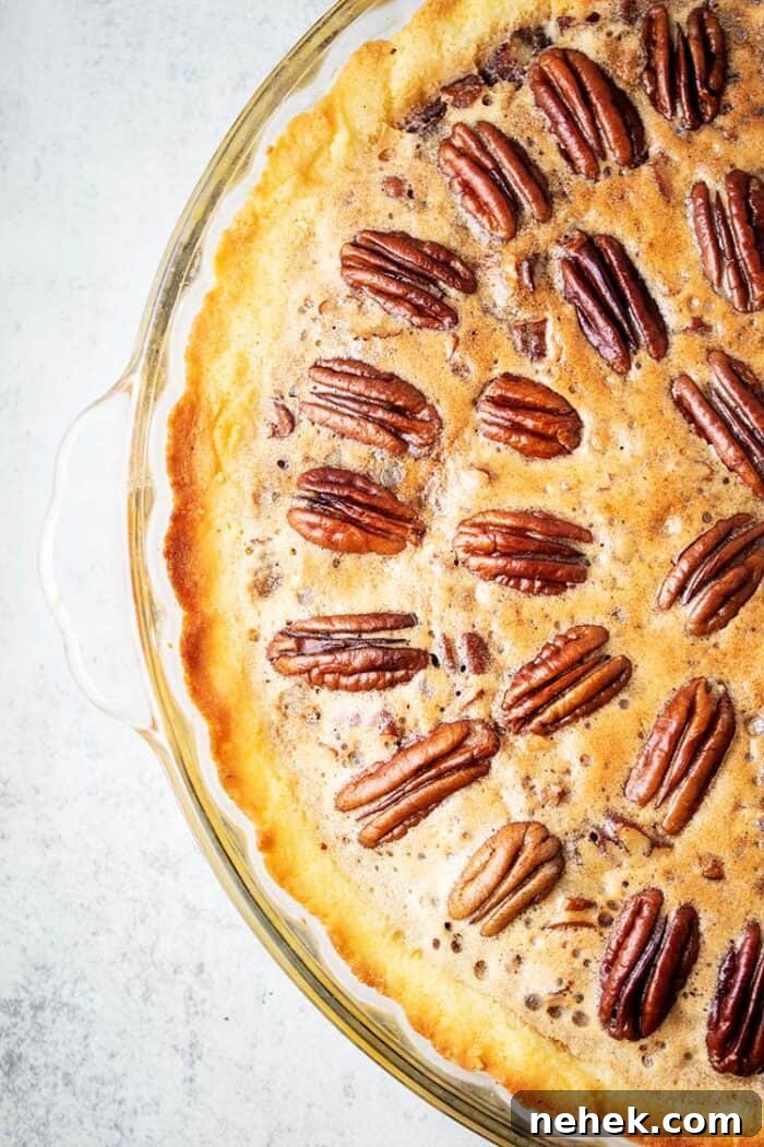 overhead view of keto pecan pie in glass dish