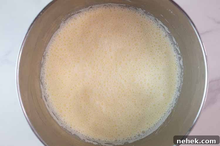 overhead view of pudding mixture on the stovetop to bring it to a boil and then simmer