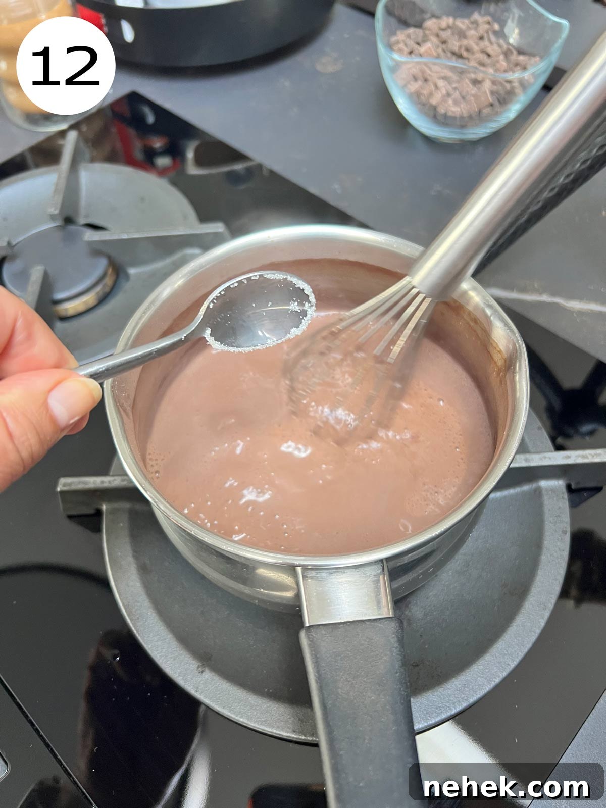 Ultimate Moist Chocolate Cake Recipe for Rich, Decadent Results 15 Sugar added to the milk sauce in a stainless steel saucepan.
