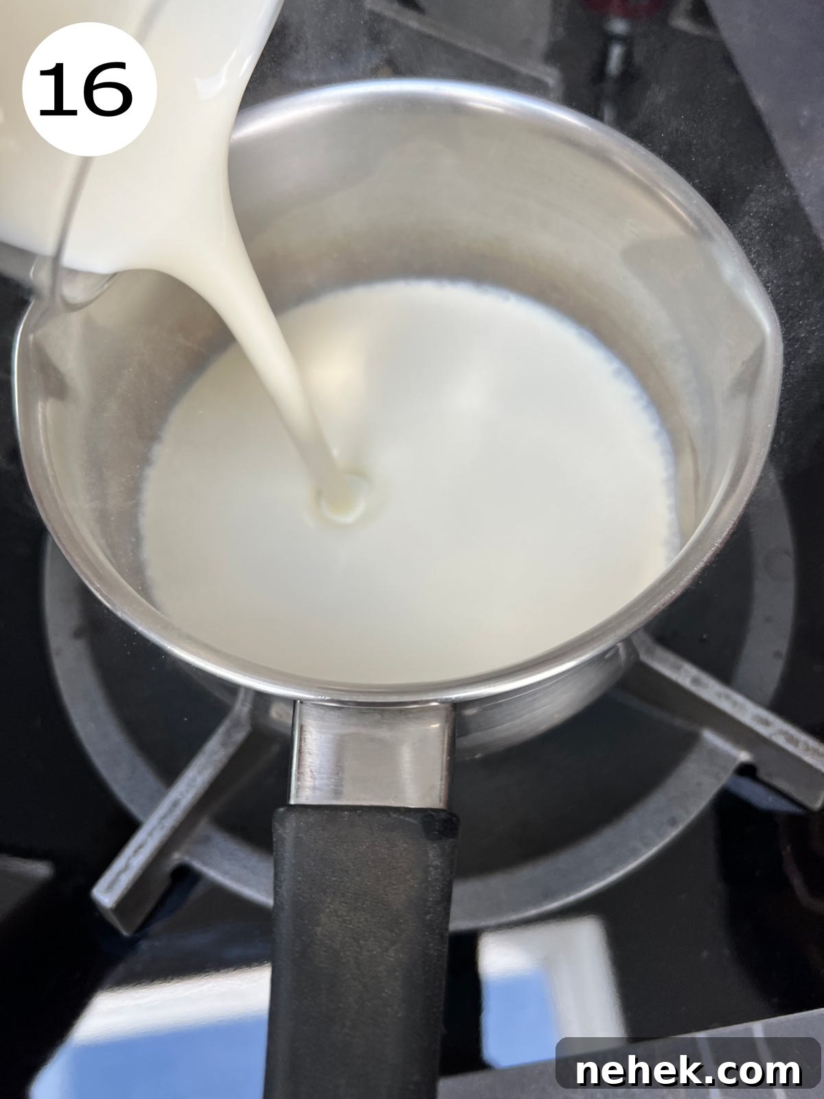 Ultimate Moist Chocolate Cake Recipe for Rich, Decadent Results 19 Preparing the ganache - heavy cream/double cream poured in a stainless steel pot.