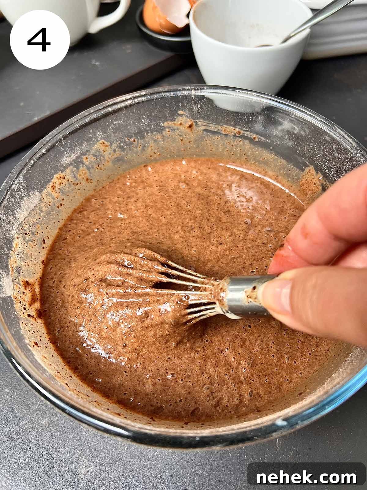 Ultimate Moist Chocolate Cake Recipe for Rich, Decadent Results 7 Moist chocolate cake, butter in a glass bowl being mixed with a hand mixer.