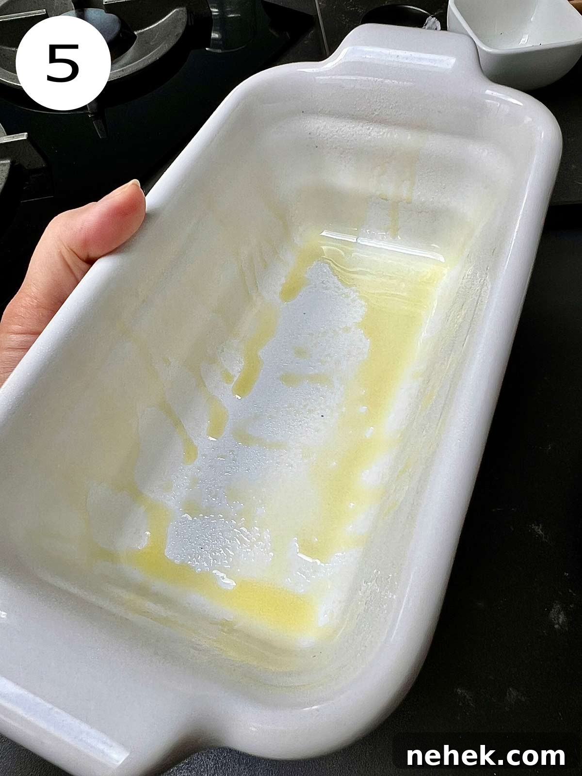 Ultimate Moist Chocolate Cake Recipe for Rich, Decadent Results 8 A white ceramic rectangular dish greased with olive oil.
