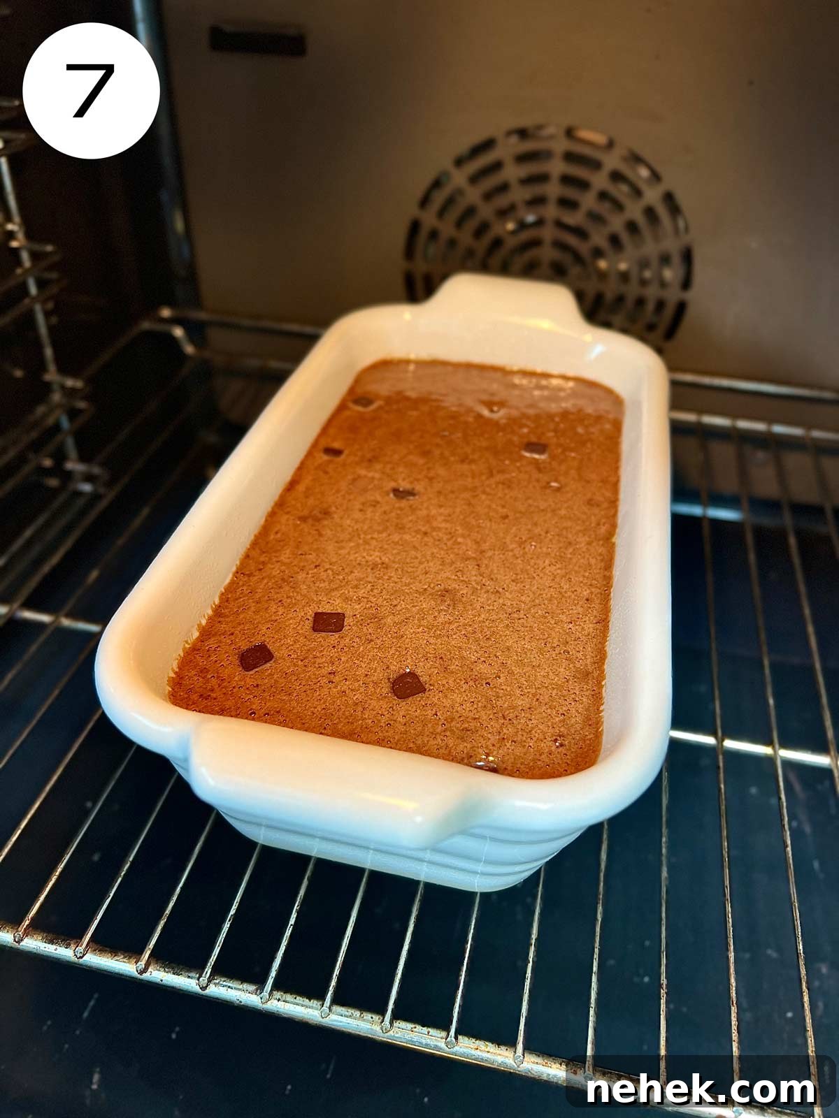 Ultimate Moist Chocolate Cake Recipe for Rich, Decadent Results 10 Chocolate cake batter in an oven oven dish placed in the oven ready to be baked.