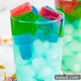 Refreshing Strawberry Lemonade Recipe for Summer Drinks 5 close up shot of glasses of Jolly rancher drink with ice and jolly ranchers