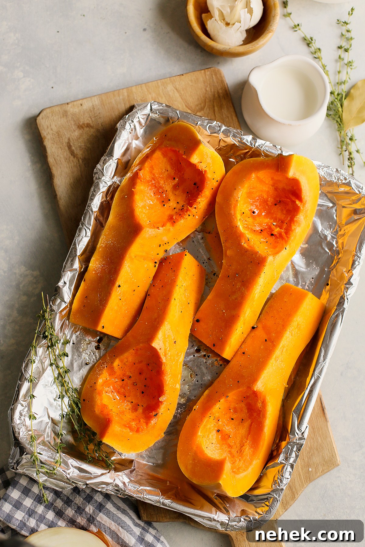 butternut squash on a baking sheet to roast for butternut and apple soup