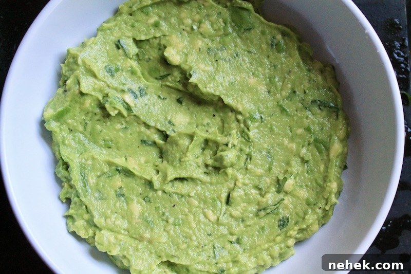 Zippy Guacamole with Fresh Pico de Gallo Topping 13 serve guacamole in a serving bowl and flatten a bit with spatula