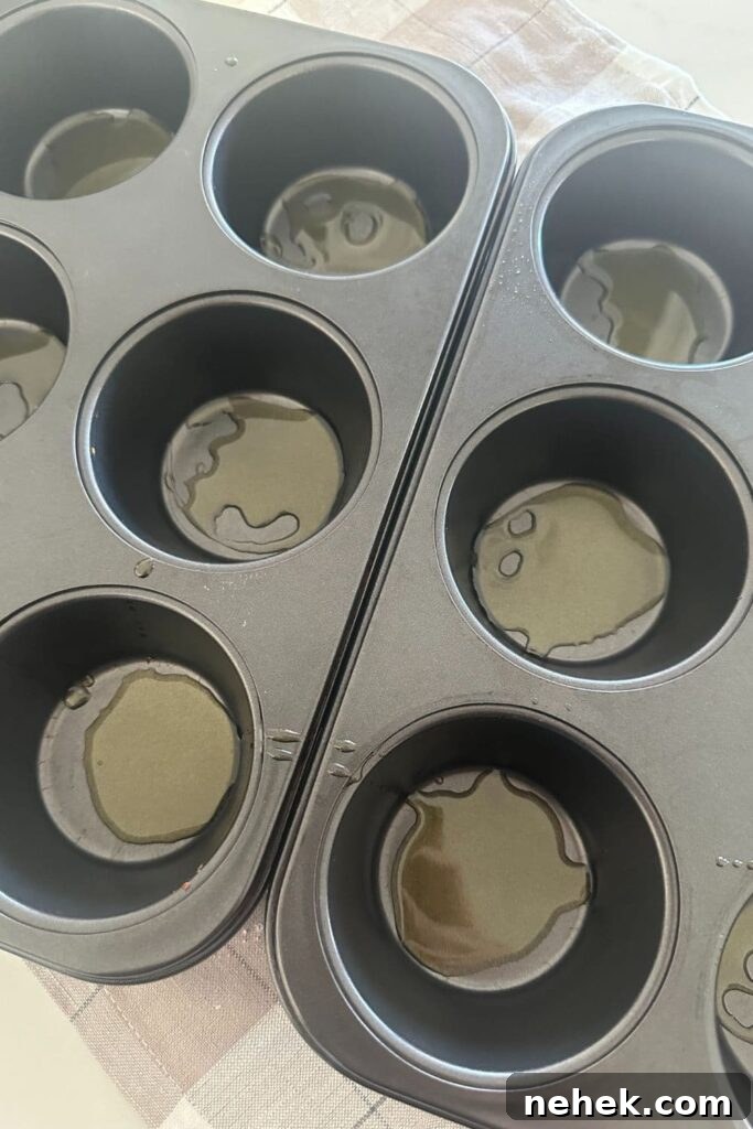 Sourdough Focaccia Muffins for Sharing: Crispy, Airy Bites 8 oiled muffin tin
