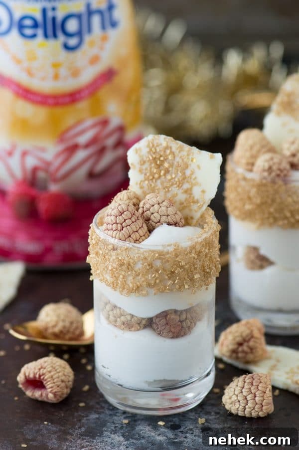 White Chocolate Raspberry Mousse Dessert Recipe 6 This easy white chocolate raspberry dessert mousse is the perfect gold dessert for New Year’s Eve!