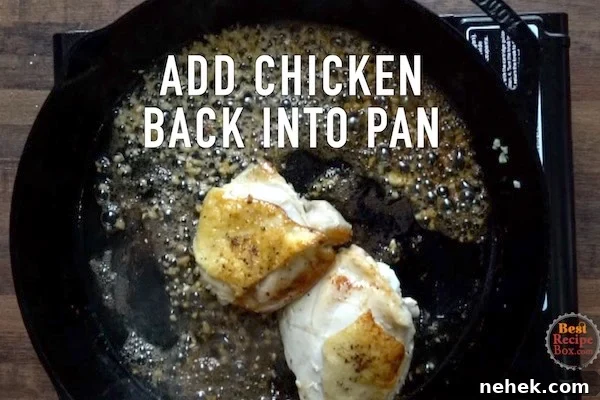 Adding chicken back to pan after putting in garlic and Worcestershire sauce