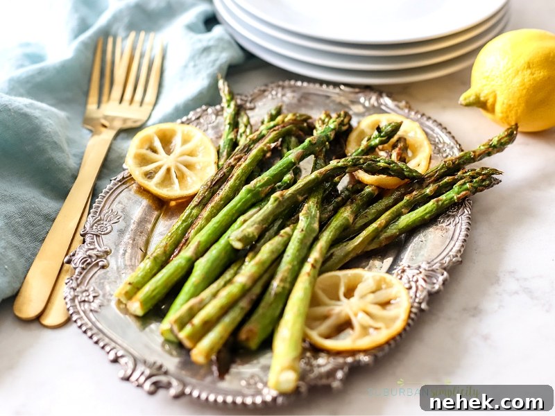 Roasted Asparagus with Lemon on a serving dish.