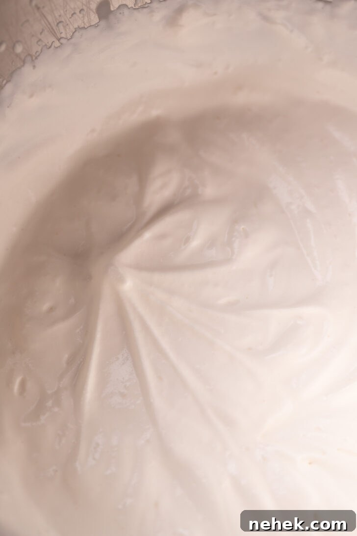 Silky Mascarpone Frosting Recipe for Cakes and Cupcakes 5 Soft peaks in whipped cream.