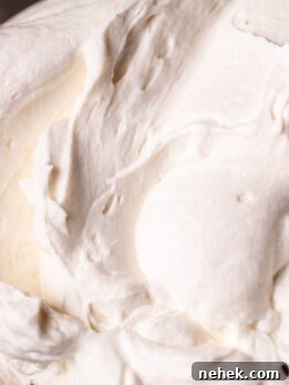 Silky Mascarpone Frosting Recipe for Cakes and Cupcakes 8 Close up of mascarpone frosting.